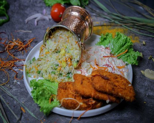 Chicken breast strips with rice and mixed vegetables