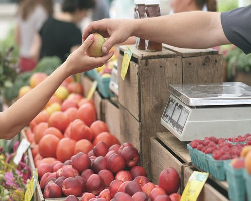 Fresh local produce displayed at a farmers market in Romania